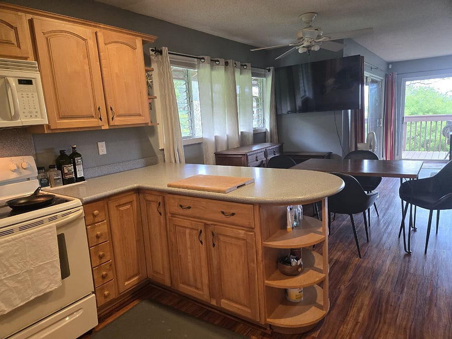 TV swiveled towards kitchen