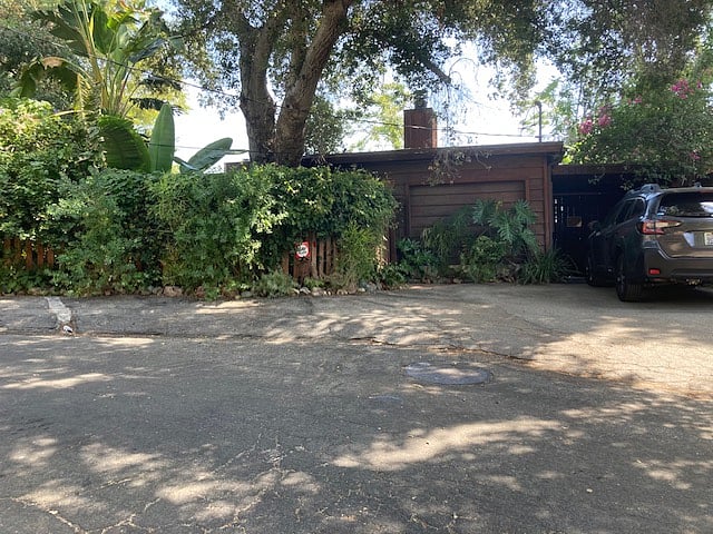 Single parking spot at gate entrance.