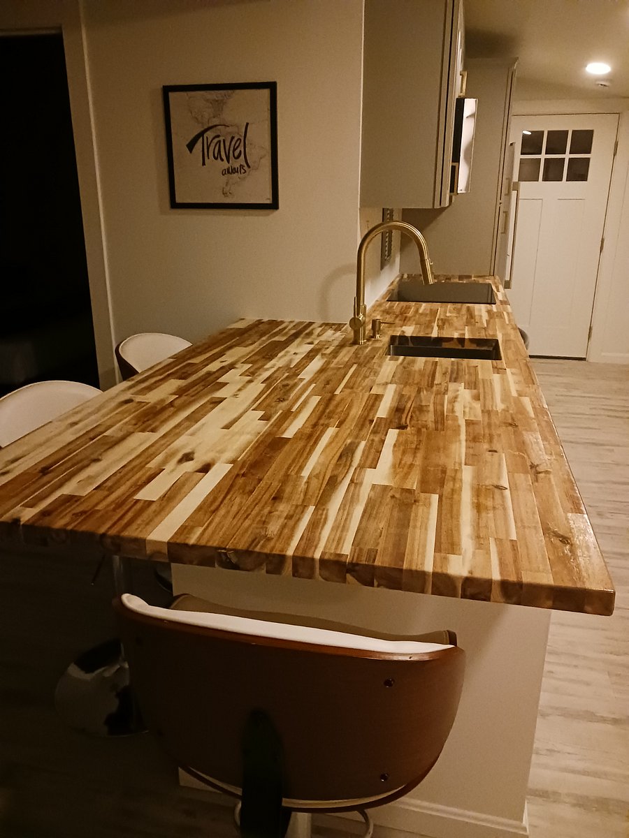 Snacking grazing area with countertop chairs to enjoy a snack or work on your computer. Also great for prepping meals.