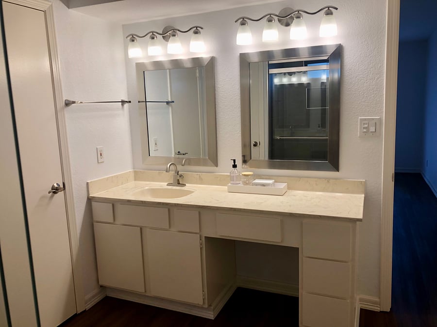 Master Bathroom with plenty of counter space and two walk in closets.