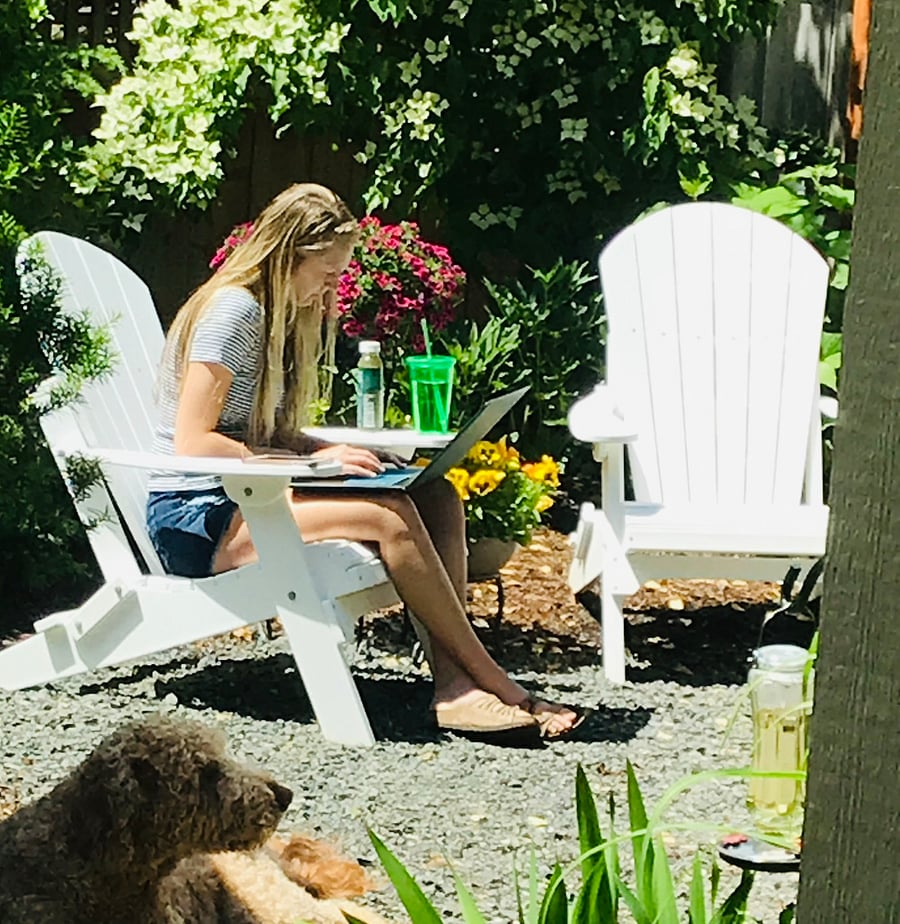 Previous tenant enjoying the lush, private back yard.