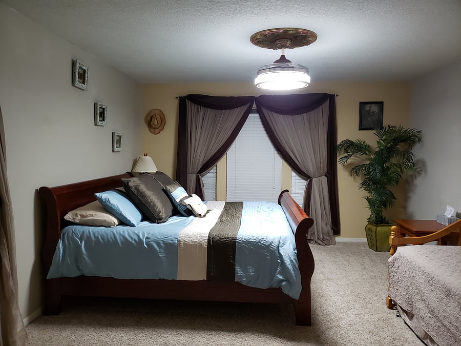 Bedroom 1 upstairs with a king size bed and a twin day bed with a trundle bed underneath for additional sleeping capacity.