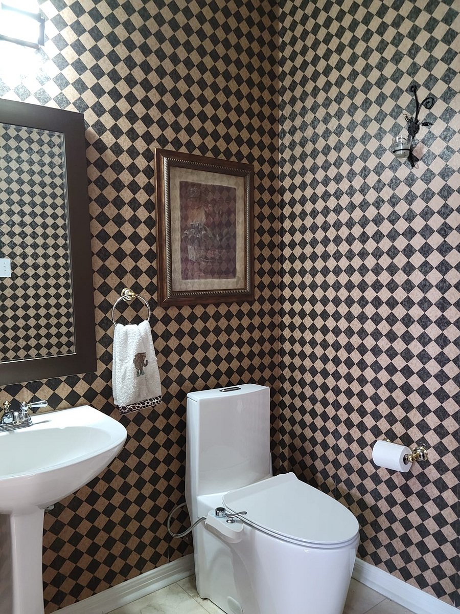 Powder room downstairs in quite spacious.