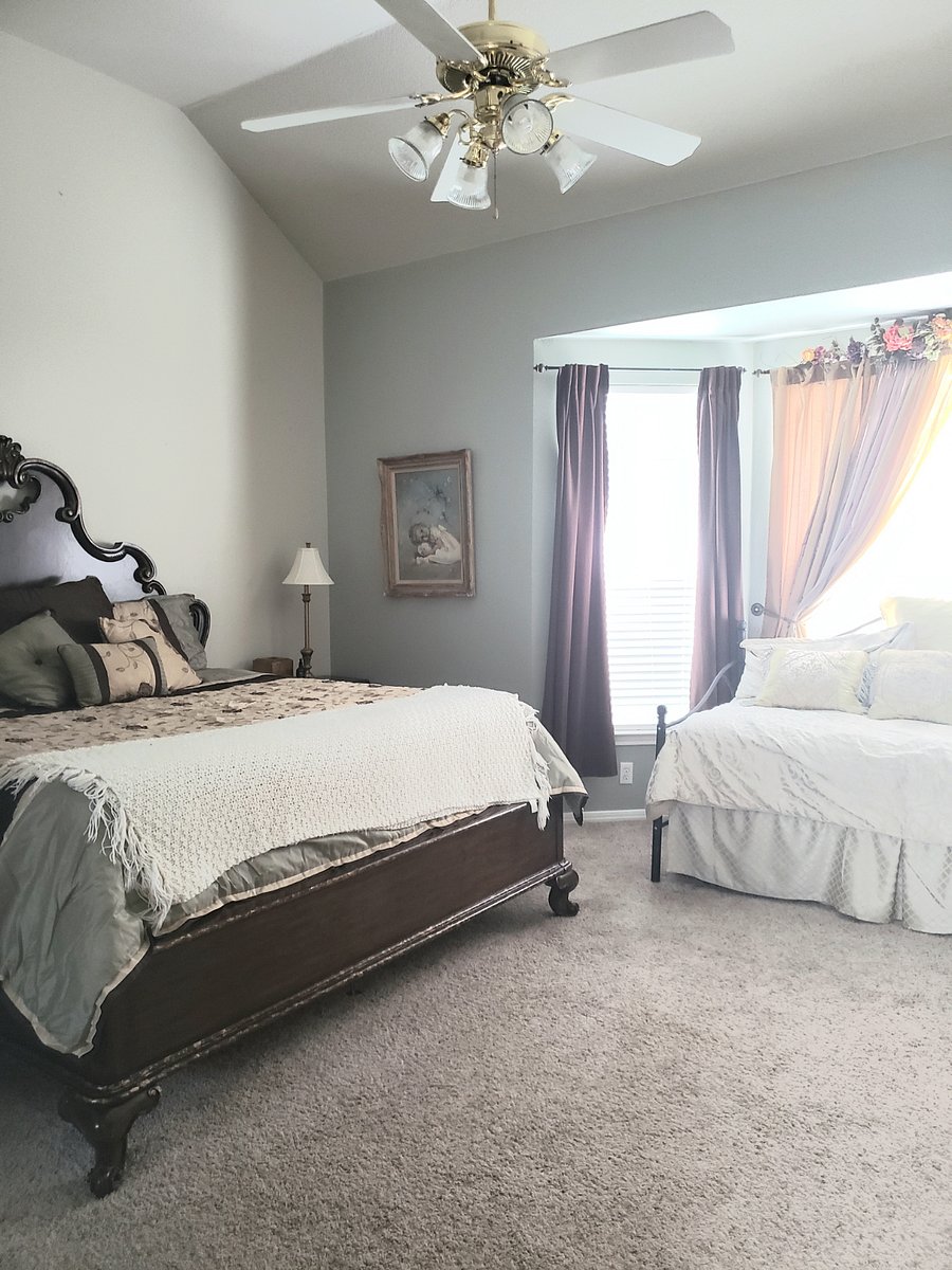 Master bedroom downstairs has a king size bed with a twin daybed and a trundle bed underneath for additional sleeping capacity and a large walk in closet.