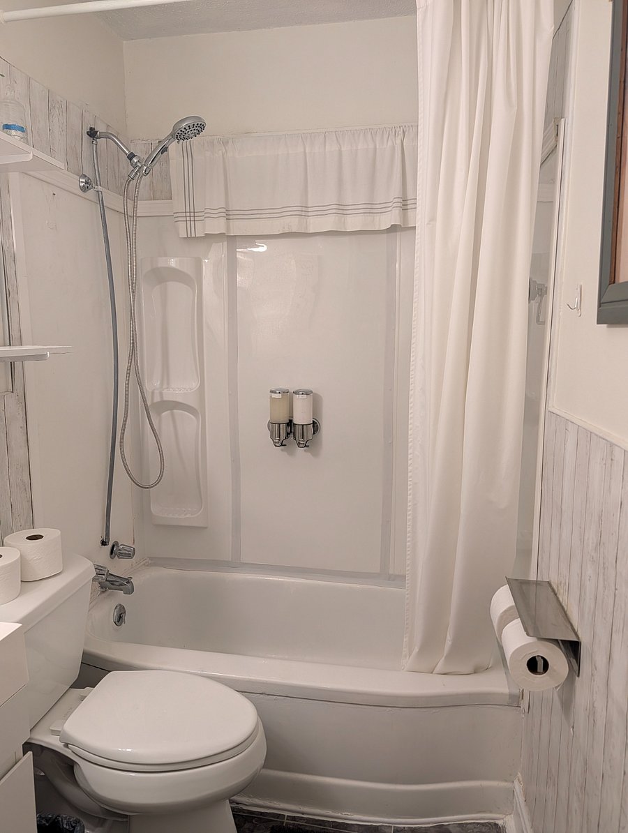 Bathroom has shower and tub