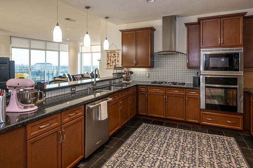 Fully stocked kitchen with microwave, fridge, dishwasher, oven etc