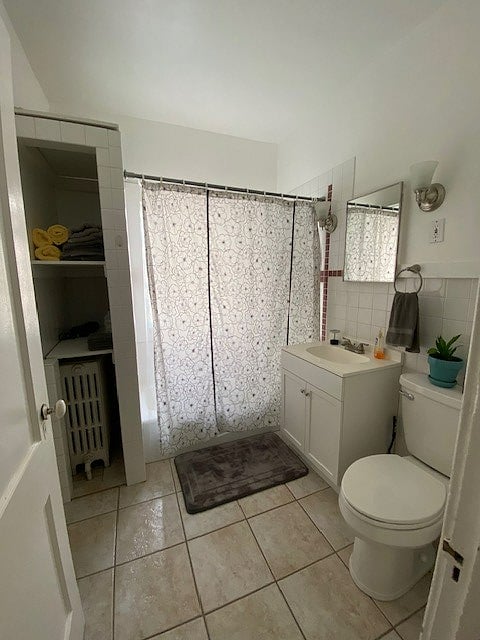 The bathroom has a privacy window that lets in light but blocks out unwanted attention. Fully stocked with TP, cleaning supplies, and towels.