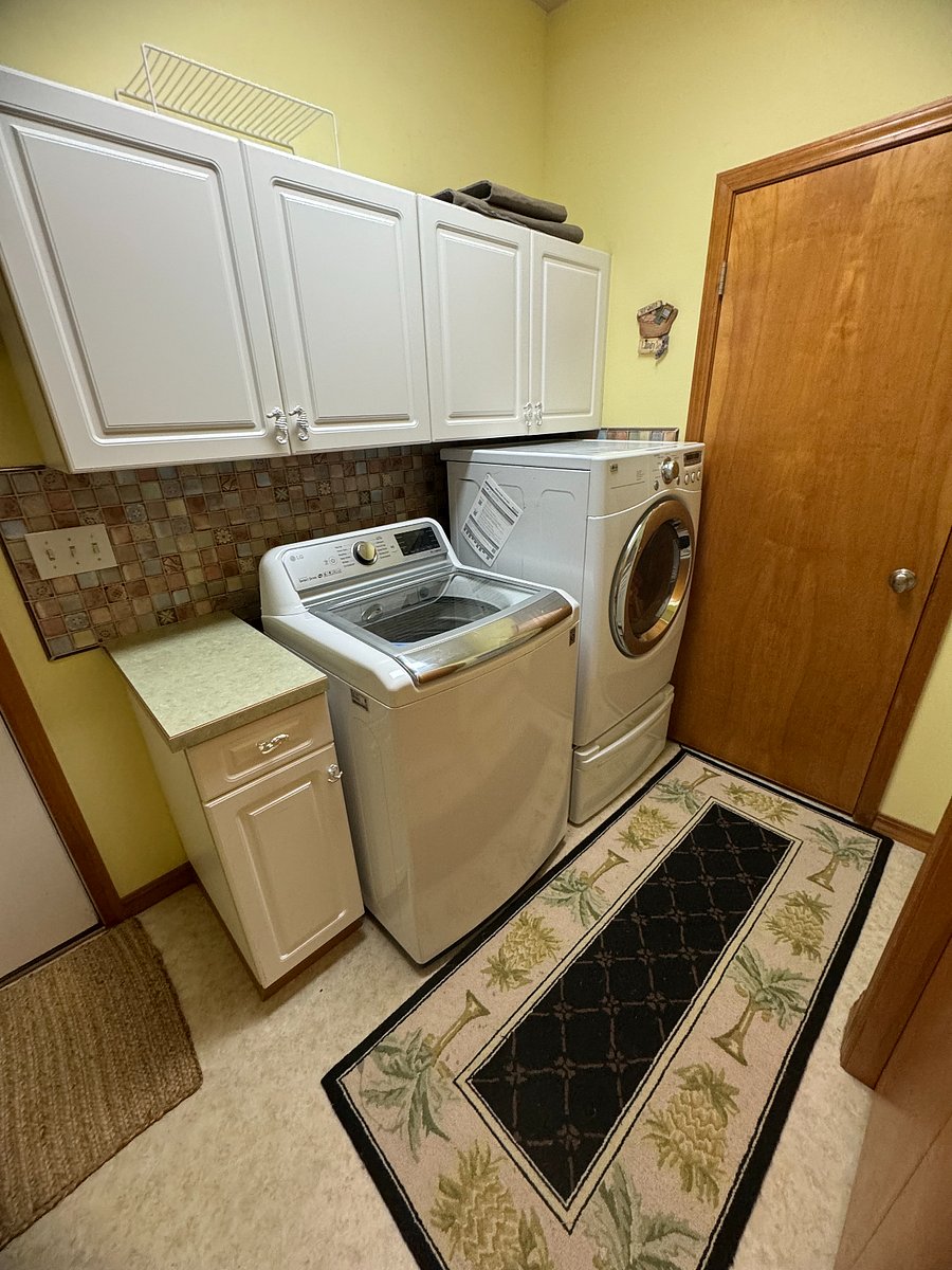 Laundry Room with Large Capacity Washer and Dryer