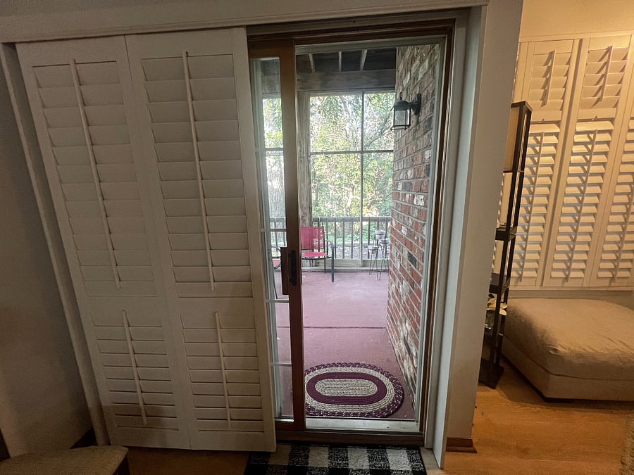 Patio Entrance: A welcoming entry through sliding glass doors, this patio leads you directly into the open living area. Ideal for an indoor-outdoor living vibe.