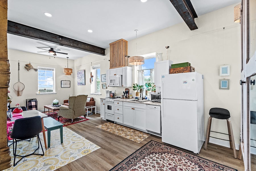 Full kitchen with dishwasher, microwave, oven and coffee machine.  All necessary utensils and china