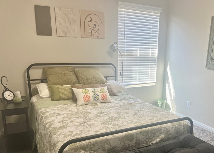 Queen bed with new matress. Side table has a touch lamp and usb/outlets on back of upper table. Table top lifts up to put your personal items or a book.