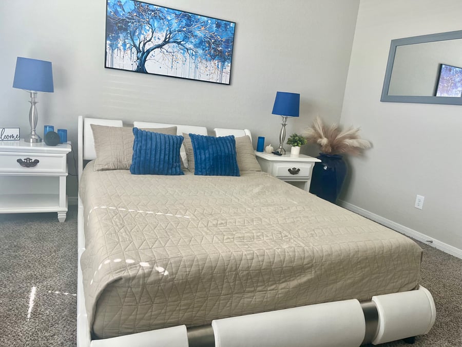 Comfortable queen size bed with new mattress.