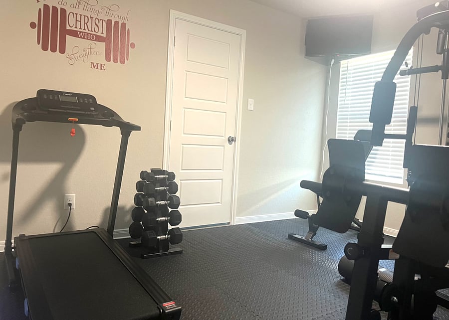 Enjoy our weight rack. Enjoy watching tv while you work out.