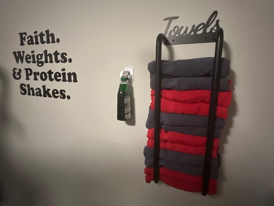 Cleaning spray and towels to wipe off equipment when done working out, or if you just need a sweat rag.  Room is next to laundry room for easy access.