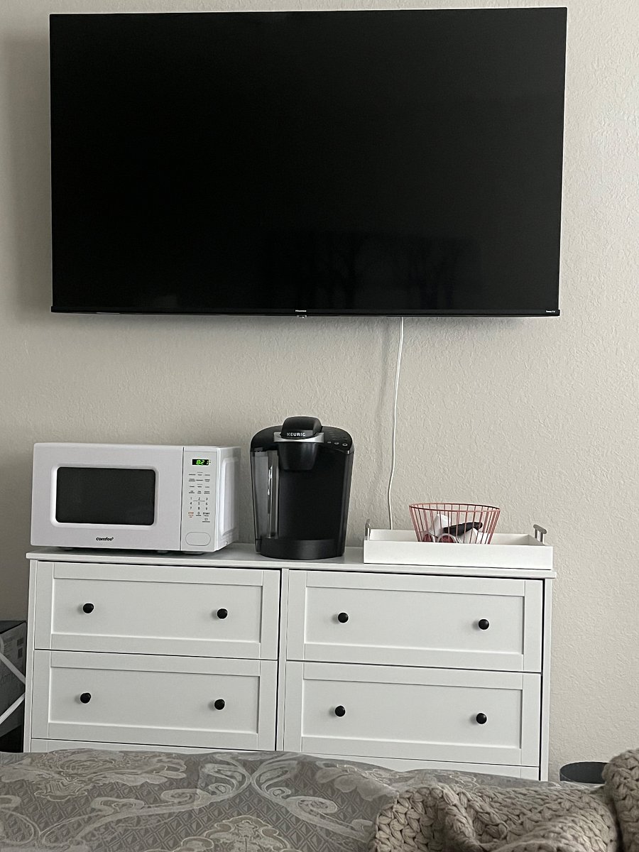 Master bedroom has its own microwave (with an auto lock), coffee/tea pot, popcorn, and condiments.
