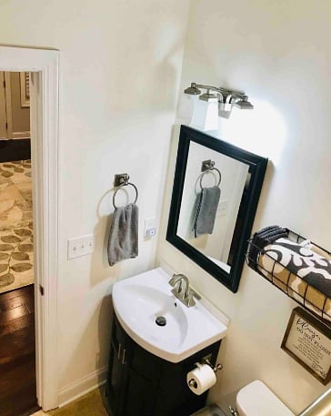 Hallway full bath. Shared bath for 2 bedrooms.