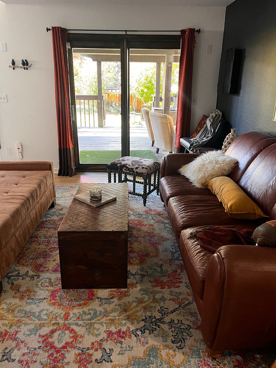 There are two dens in this home. Its a four level. This is the extra den that leads to the patio. Its common space.