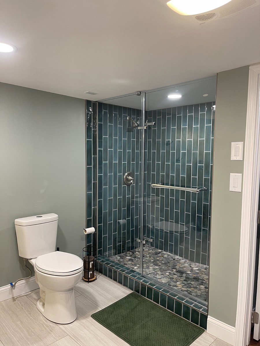 Tenant bathroom with shared laundry.