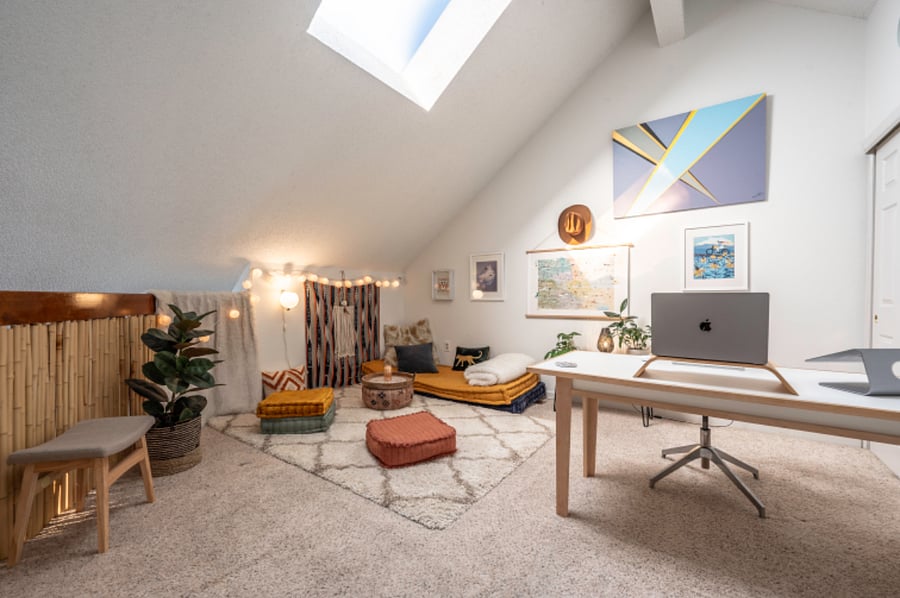 Upstairs loft with dedicated workspace and lounge area