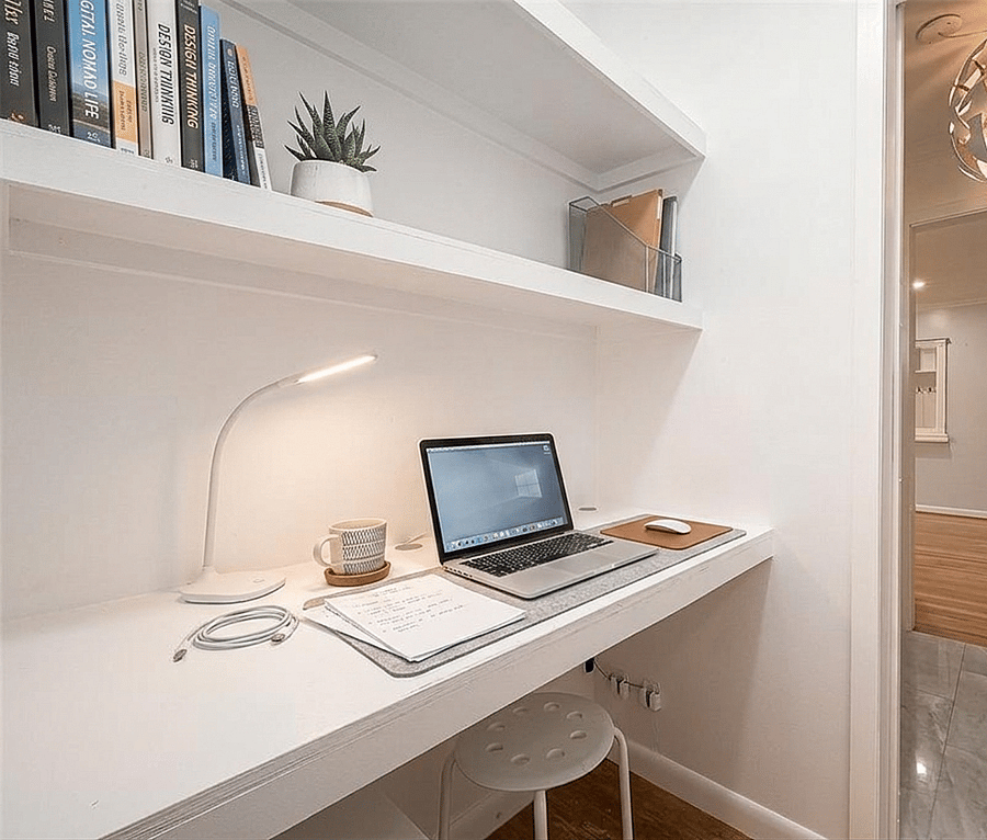 Dedicated office nook adjacent to the room, perfect for working remotely, studying, or catching up on notes in a quiet space.
