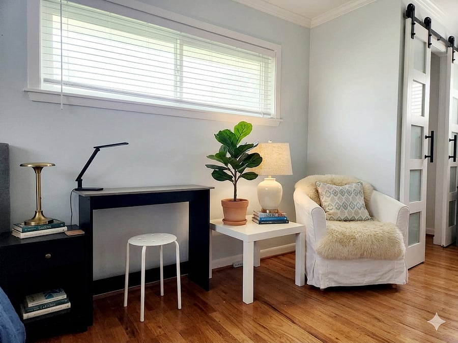Dedicated sitting area with a cozy chair, perfect for reading, relaxing, or unwinding after a long day.