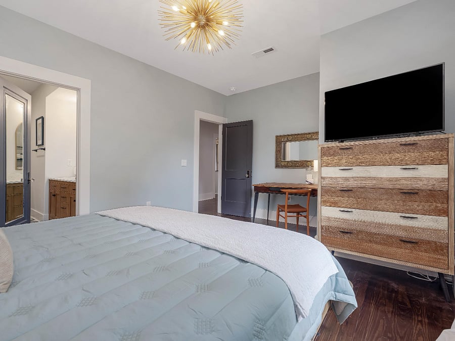 primary room with king, walk in closet, Roku TV, full bath with dual sinks etc! 