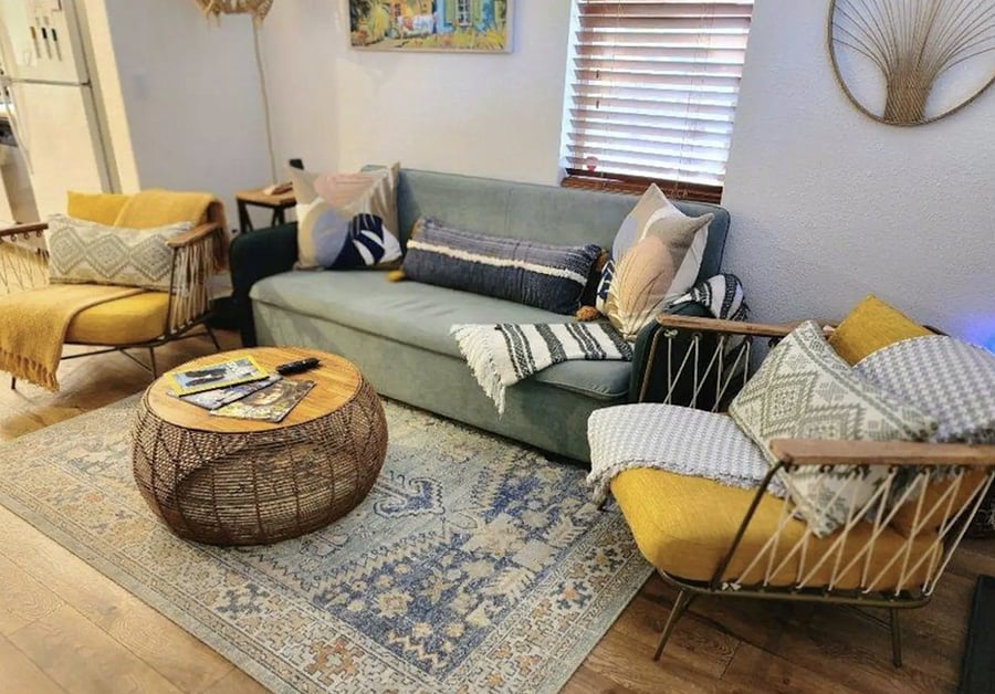 Living features: Seating for 5, and 2 small stools as extra seats King Size convertible sofa bed Roku TV with all streaming apps Wireless charger on end table USB outlet on left side of sofa Games & cards in TV console St. Aug info books