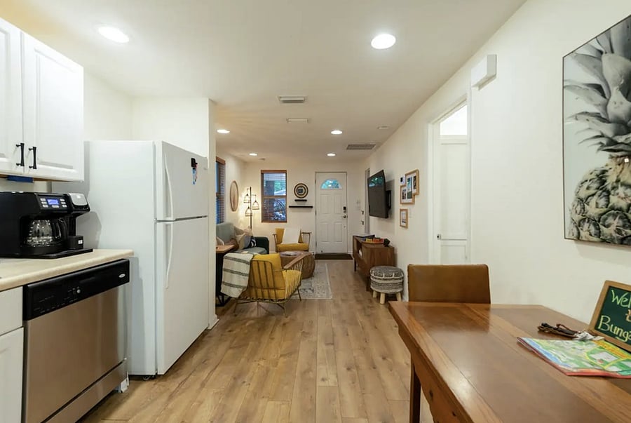Fully stocked kitchen with: Great quality pots, pans & utensils Broad variety of spices Blender Coffee maker with full pot & K-cup feature Variety of teas Dishwasher Dinette table that unfolds to seat 4