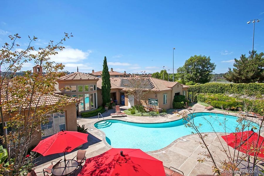 Pool, spa, grill, and entry to gym