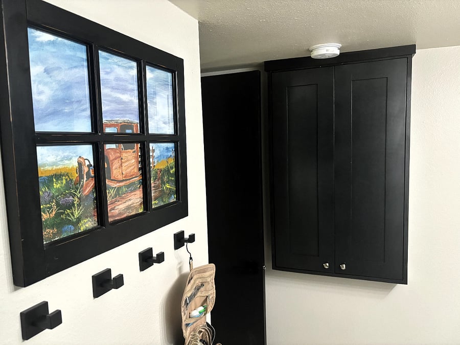Handy bathroom storage hooks and cabinet