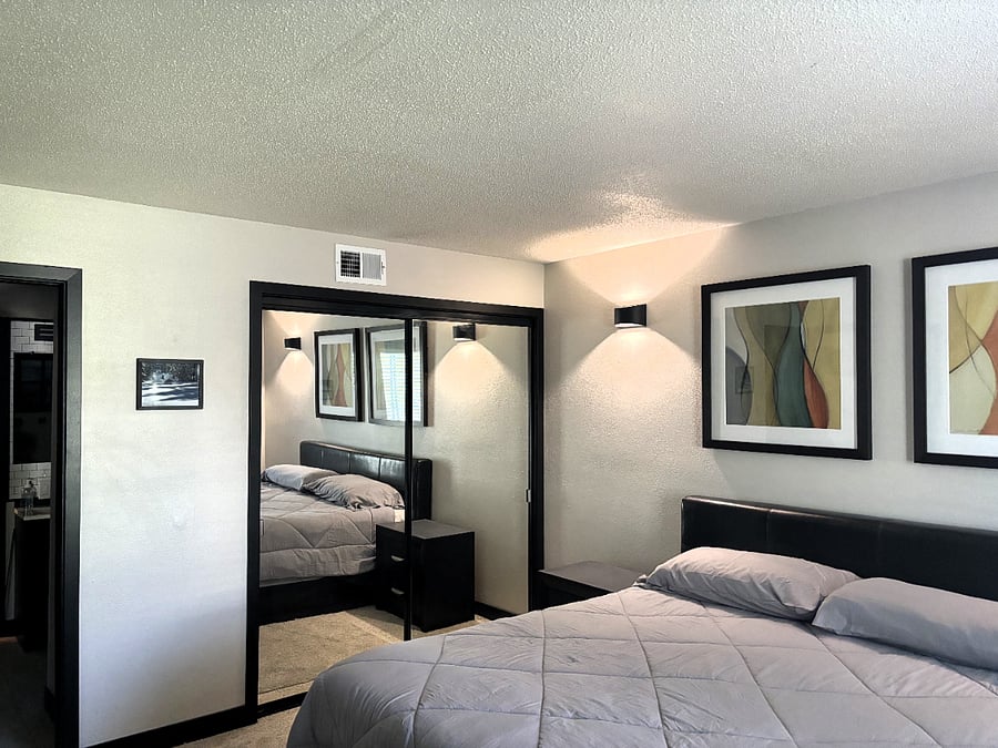 Primary suite has a comfy king bed