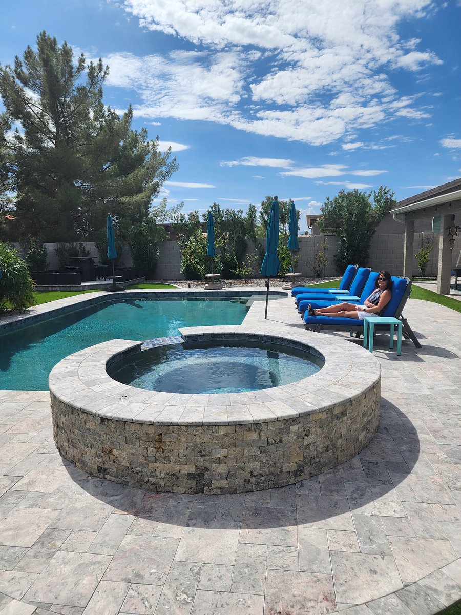 Pool & Hot Tub with beautifully tiled patio and pool deck.