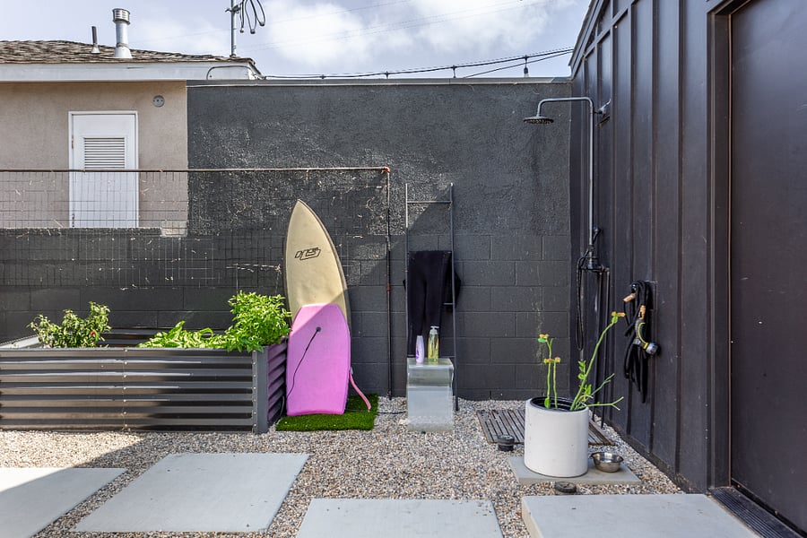Outdoor shower and vegetable garden