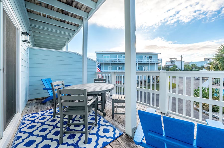 Private covered balcony off of living room