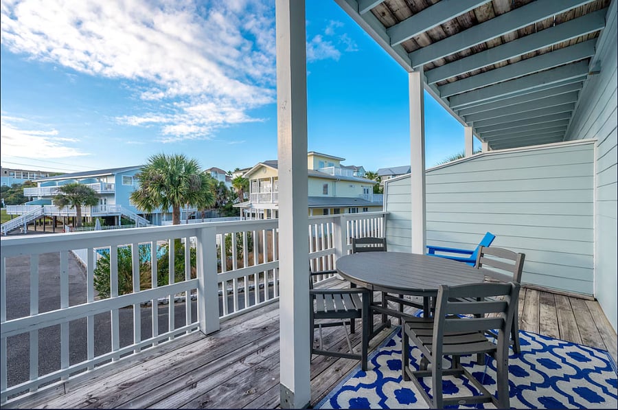 Private covered balcony off of living room