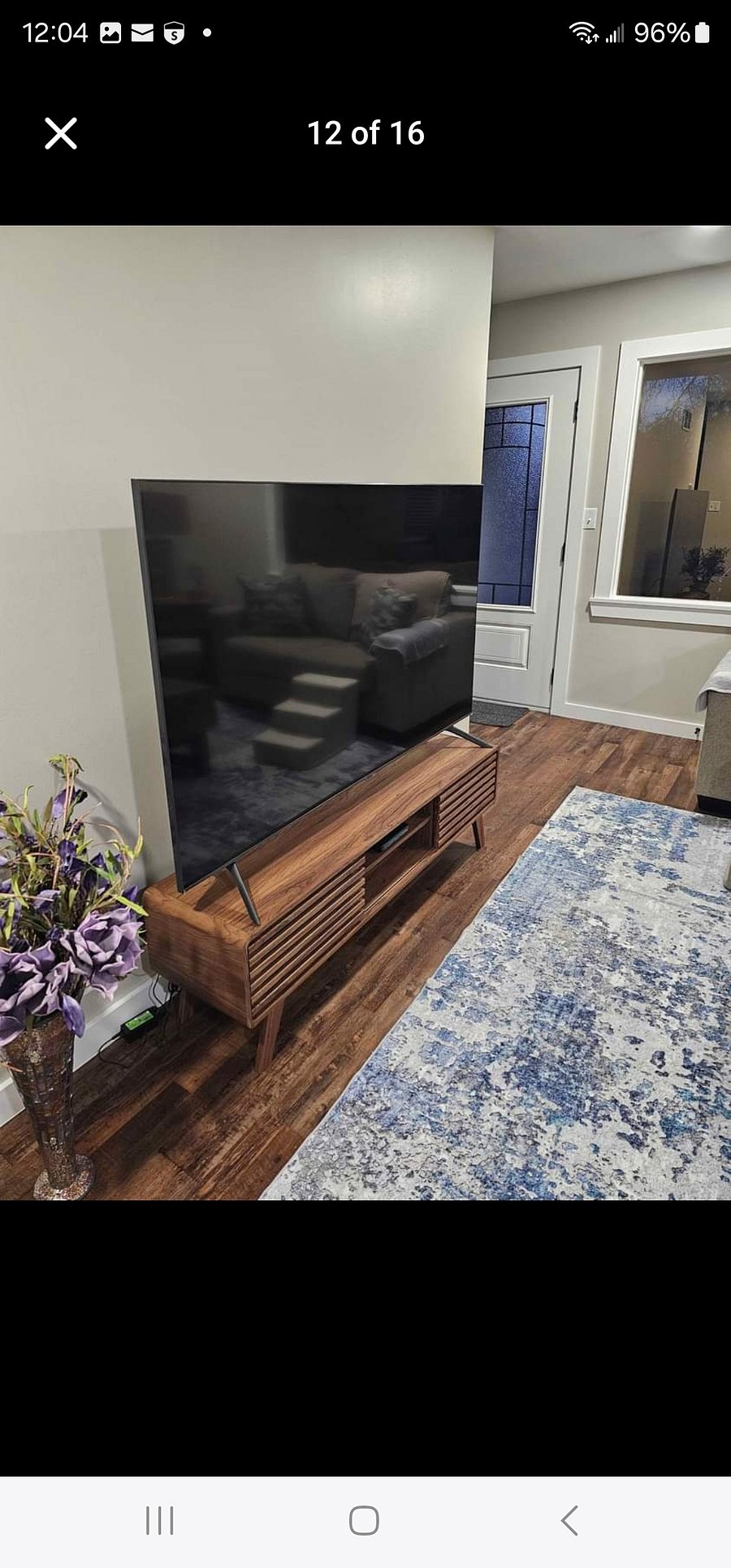 Living room 75 inch Samsung smart TV with Directv