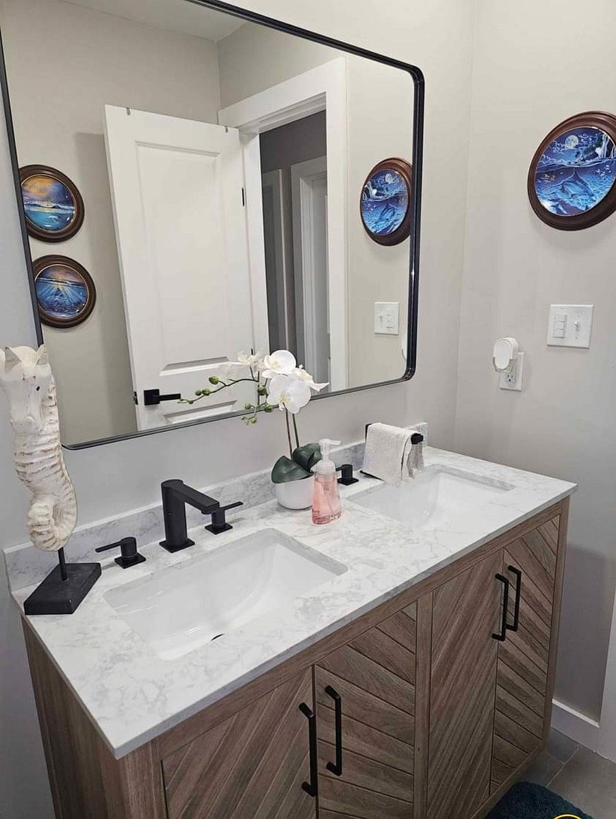 Shared bathroom dual sinks. You will have your own personal sink and storage