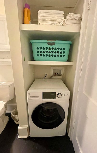 combination washer/dryer in bath area