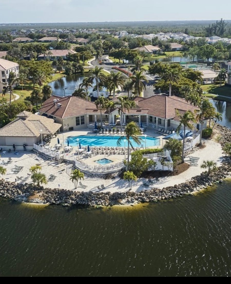 pool and tiki bar with poolside beverage and food service