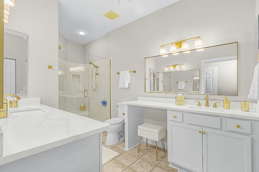 Primary bathroom with double sinks and walk in shower