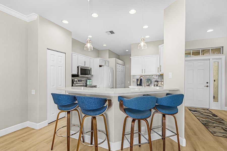 Kitchen counter with bar stool seating