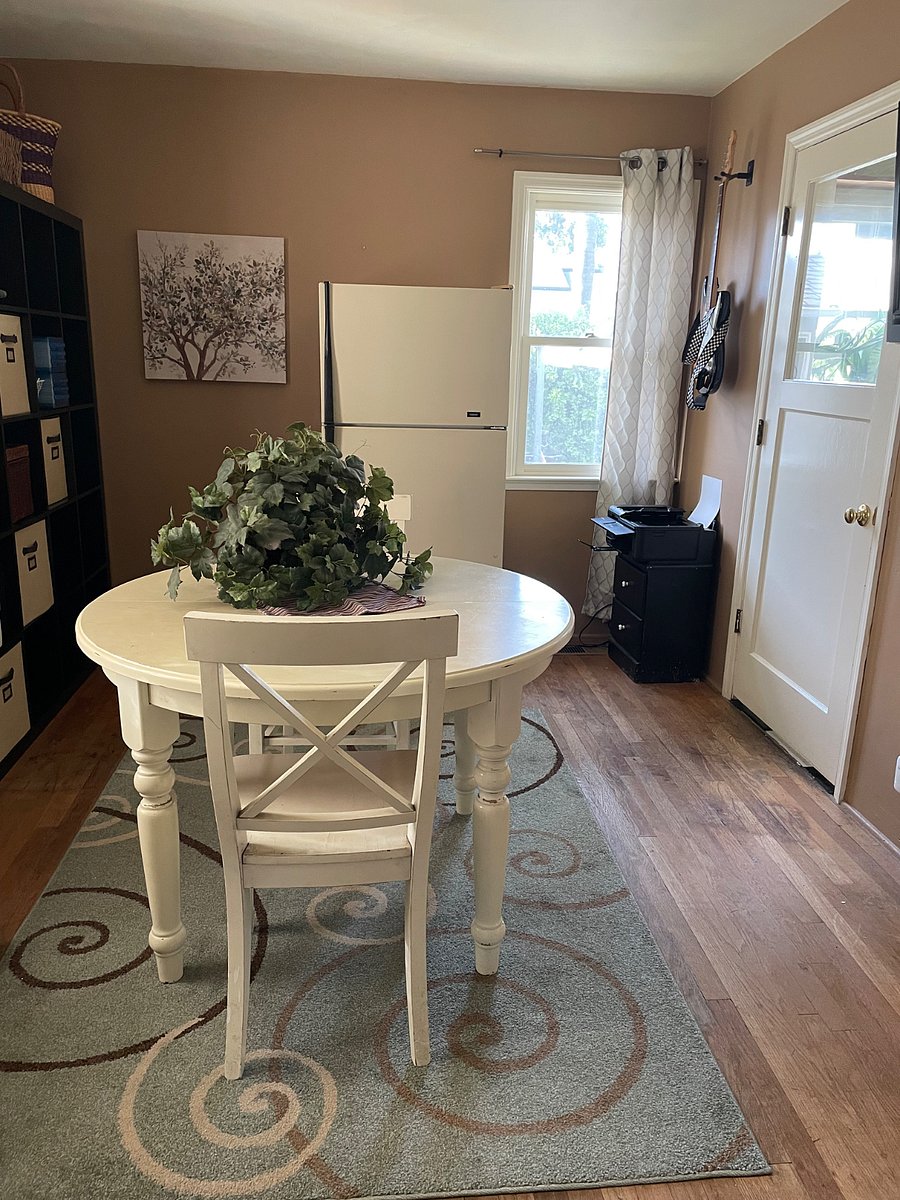 This is the Common Room shared by all household members and guests. The table is available to you and so is a wall mounted Monitor for you to connect to for streaming. Also available as a meeting space by arrangement. The fridge is a shared space for our other guests and in house occupants.