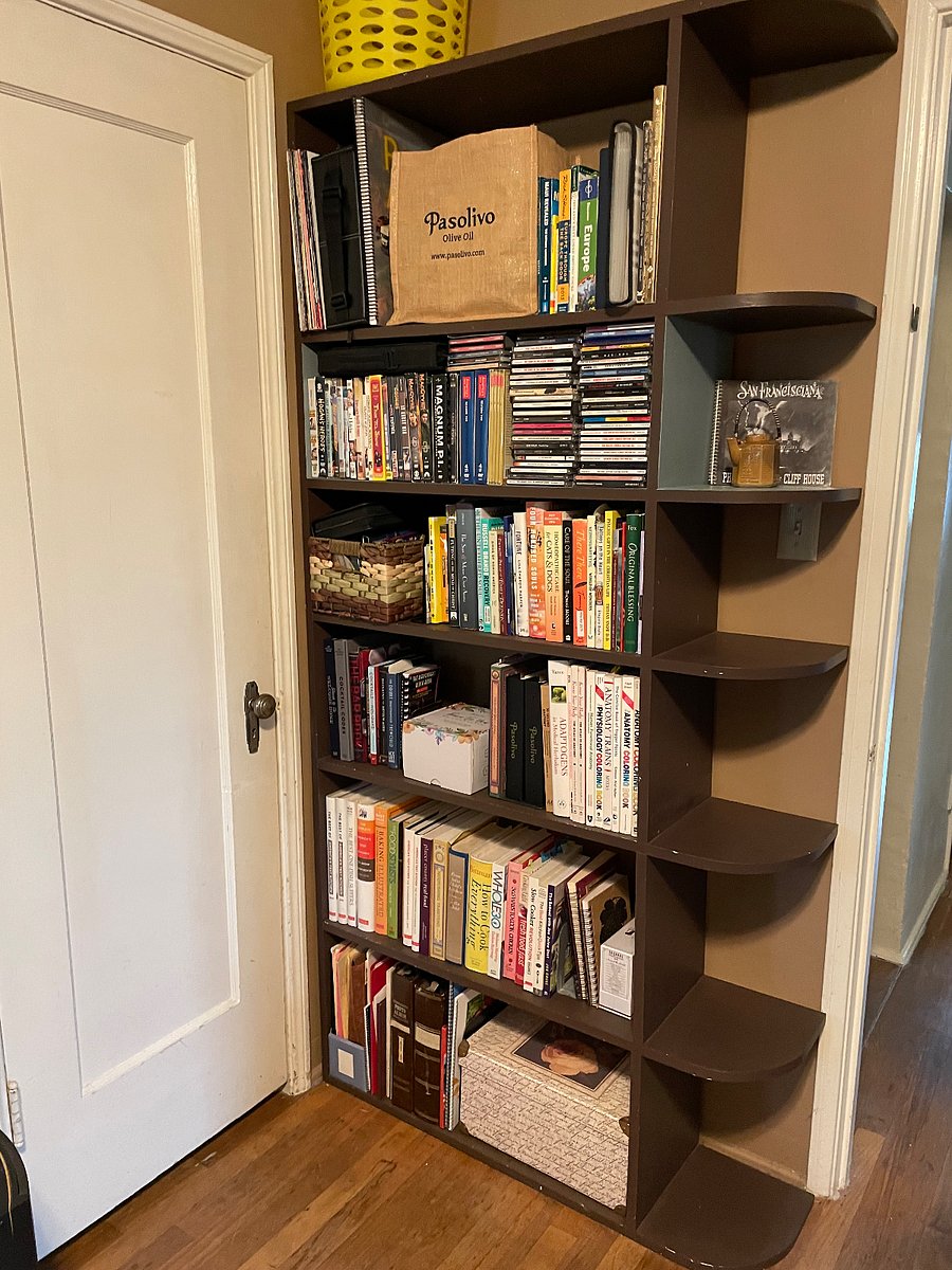 Here is a little library. Add your own books (we'll make space for you) or peruse ours (especially the cookbooks for when you arrange to cook in our custom kitchen.