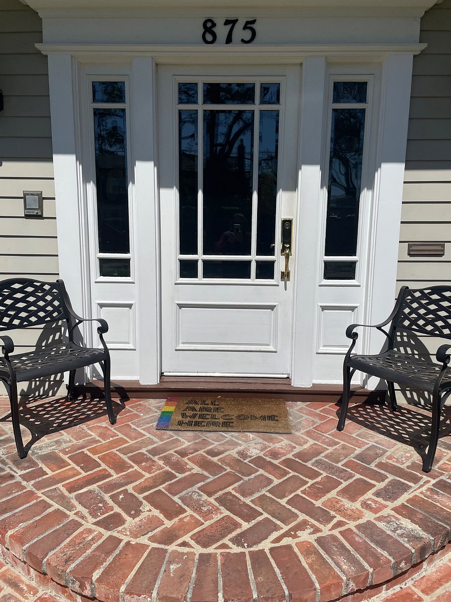 This is the front door to our home. Your entrance if up a short driveway in the cozy back yard. Very private space that is also shared by the household.