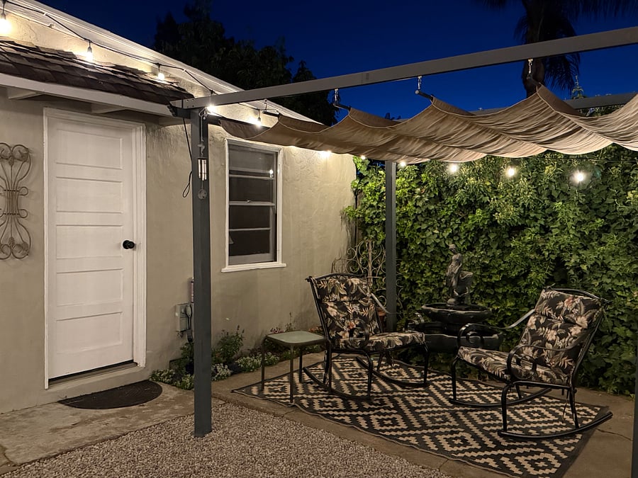 Warmly lit, beautiful sitting area with gentle water feature and comfy chairs. Great place to unwind.