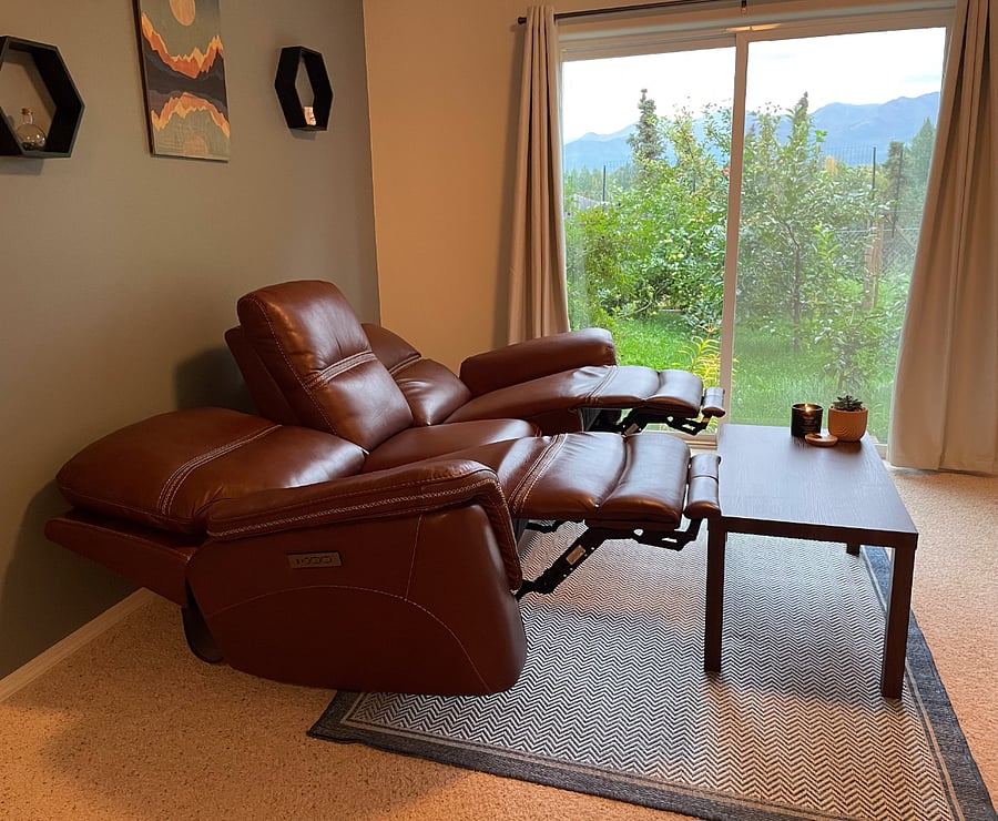 Provided couch recliner that can lay down flat and adjust headrest angle