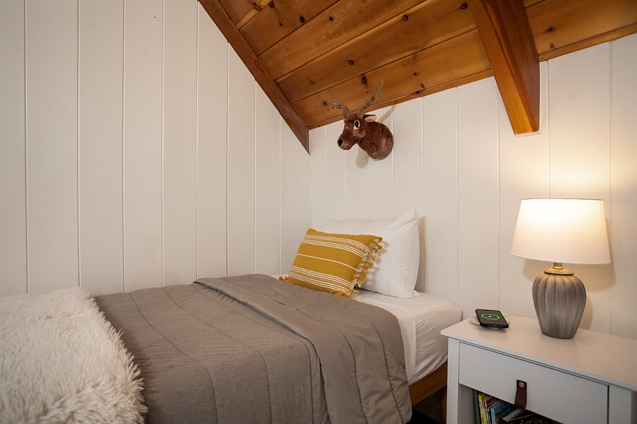 Bedroom #3 also comes equipped with cute decor and books