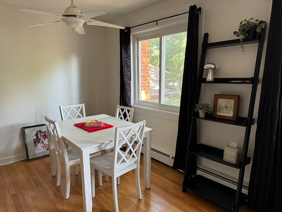 The dining room table easily seats 4 - perfect for dinner as well as games, puzzles, and projects.