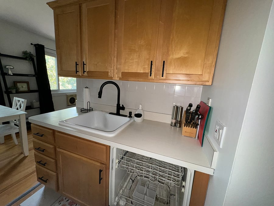 We updated the kitchen faucet - I know you'll love it!