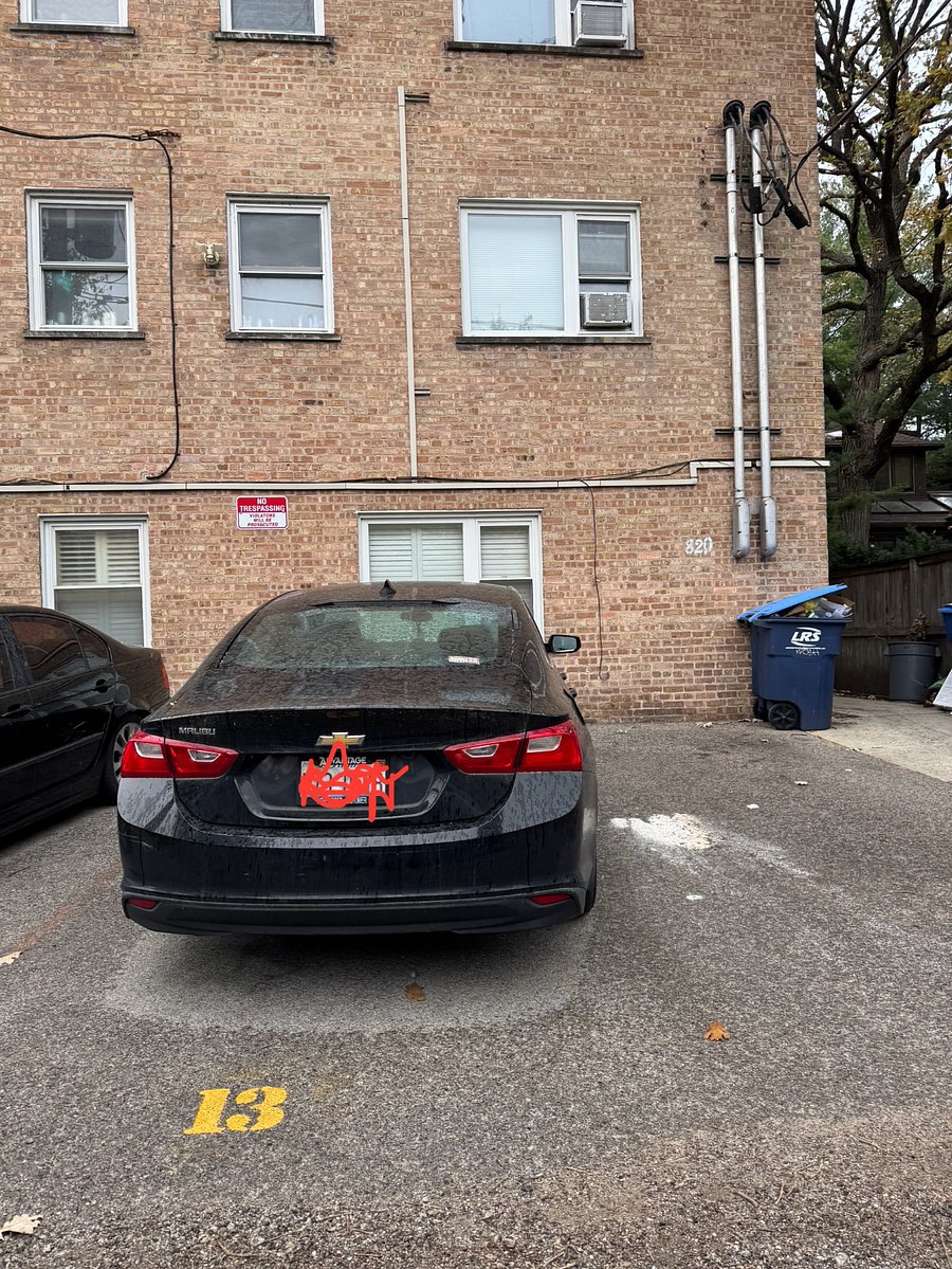 The Reserved Parking Space is behind the building, just one spot from the sidewalk on the east side of the building, where the unit entrance is located.